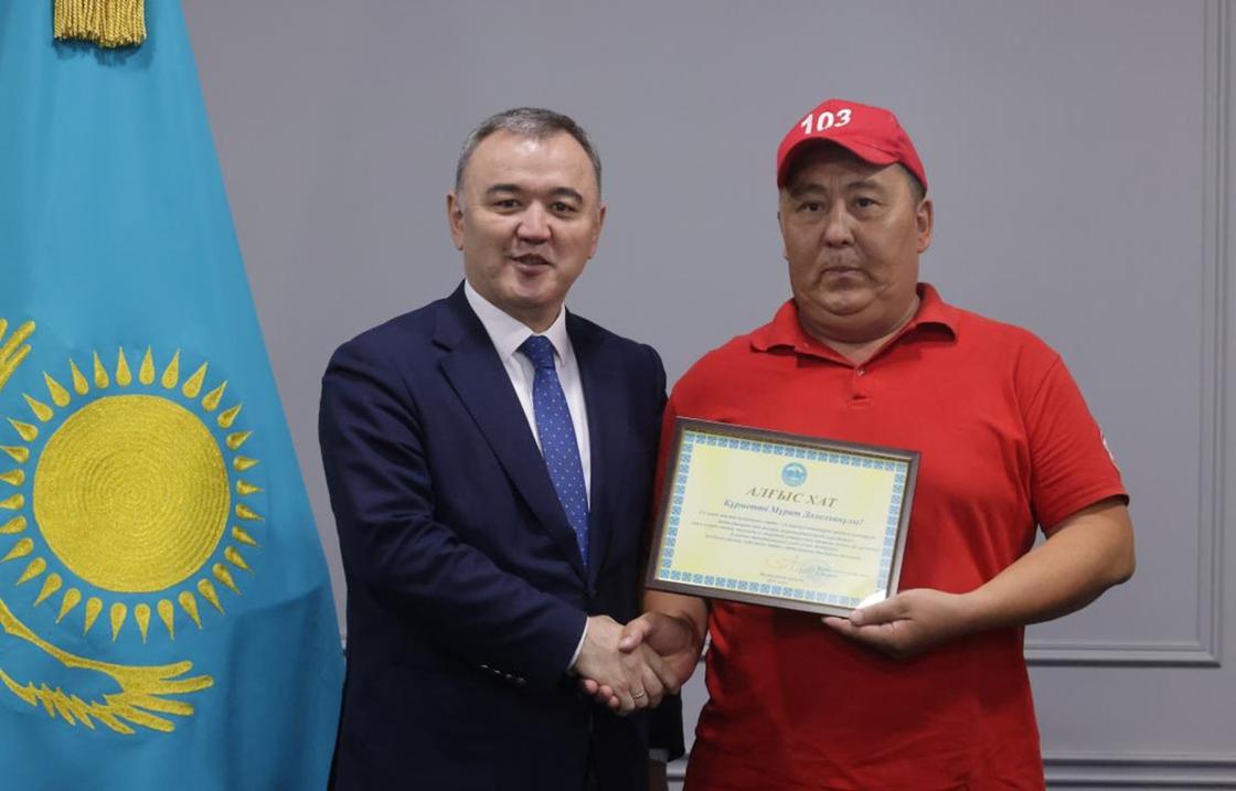 Марлен Көлбаев пен көлік жүргізушісі Мұрат Сатеков