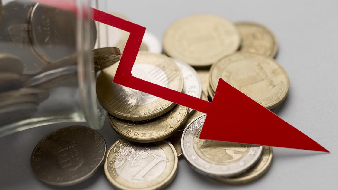Знак падения цен на монетах