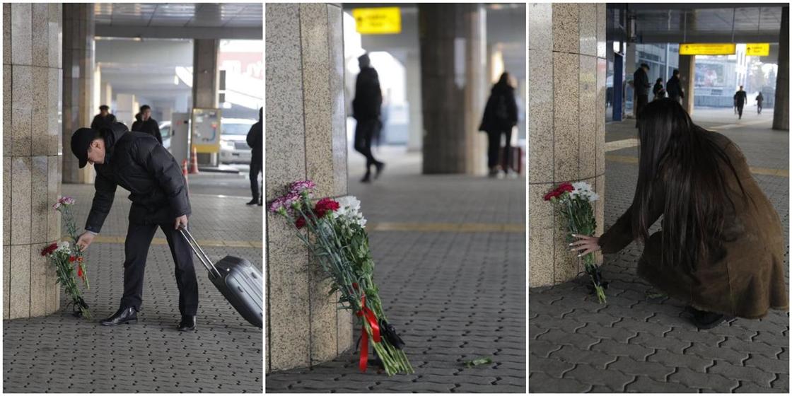 Алматинцы несут цветы к зданию международного аэропорта