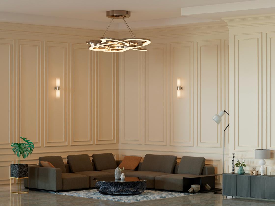 Минималистичный дизайн гостиной в кремовых тонах с контрастной темной мебелью