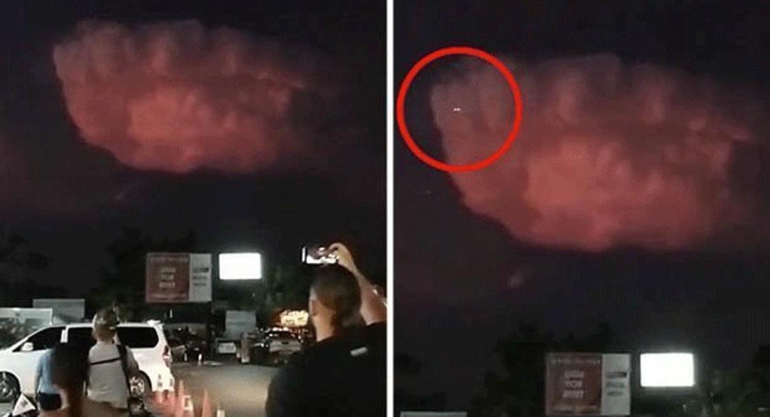 Напуганный турист снял, как над красным облаком парит странный светящийся объект