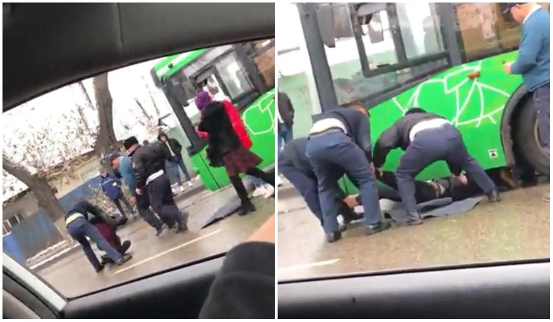 Пьяный мужчина лег под автобус в Алматы
