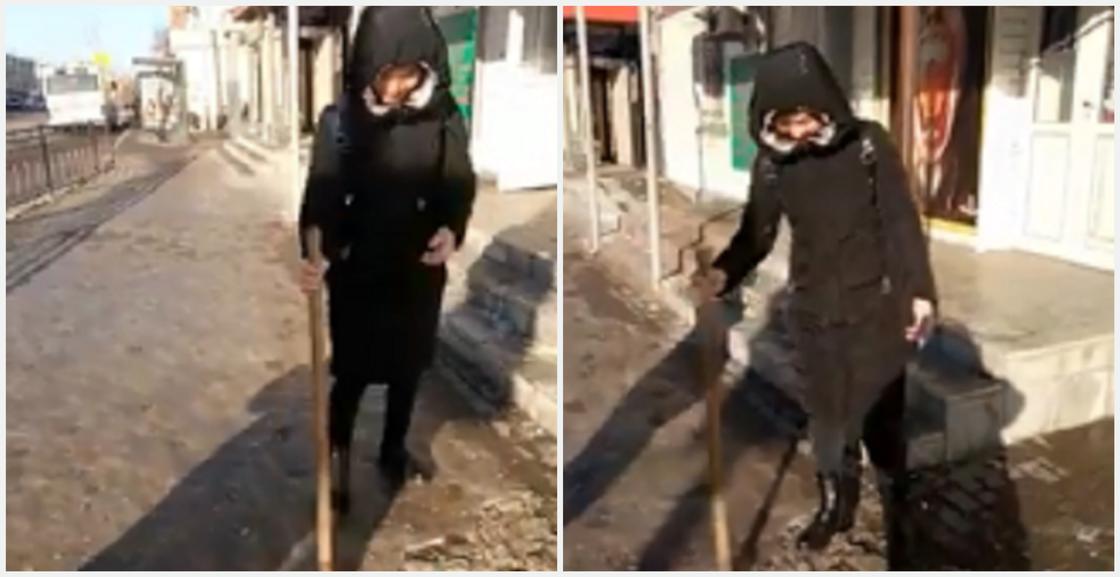 Астанчанка помогла дорожному рабочему колоть лед на асфальте (видео)