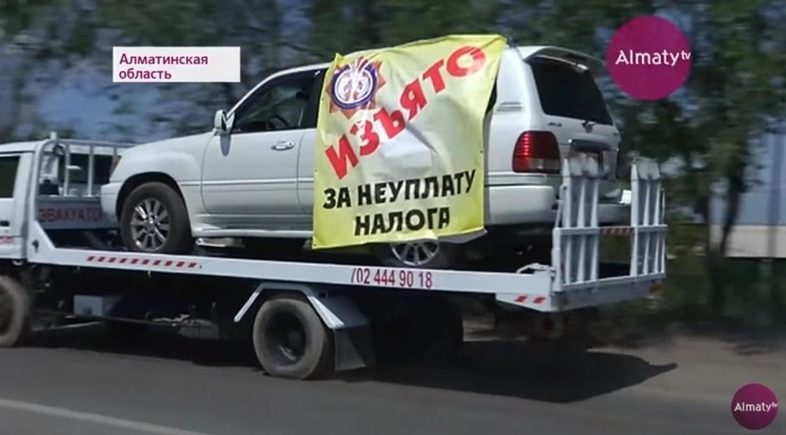 Авто класса люкс начали отбирать за неуплату налогов в Алматинской области