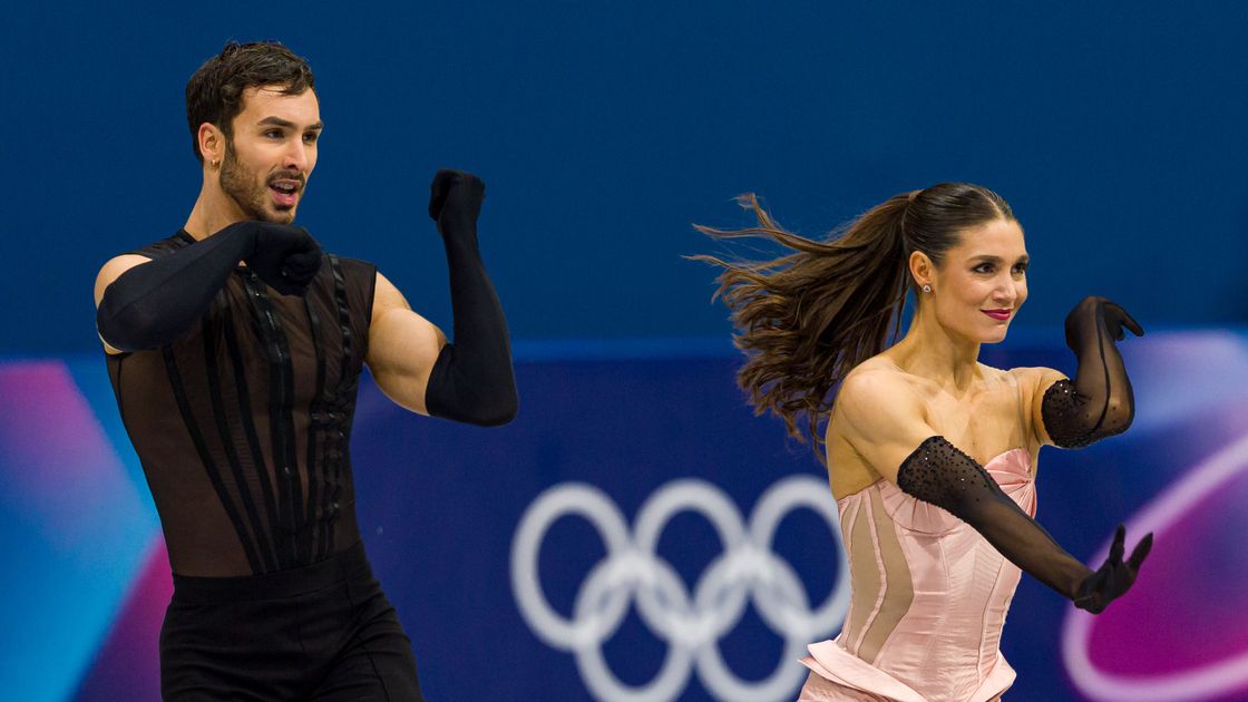 Французские фигуристы Лоранс Фурнье-Бодри и Гийом Сизерон (справа налево)