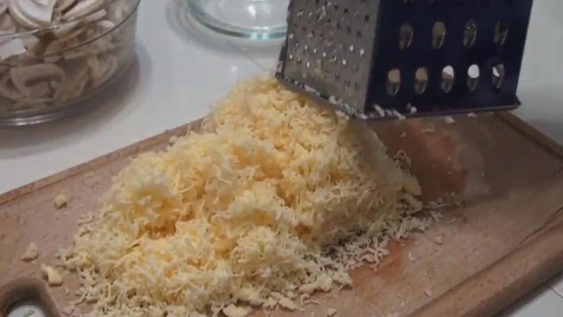 The cheese is finely grated