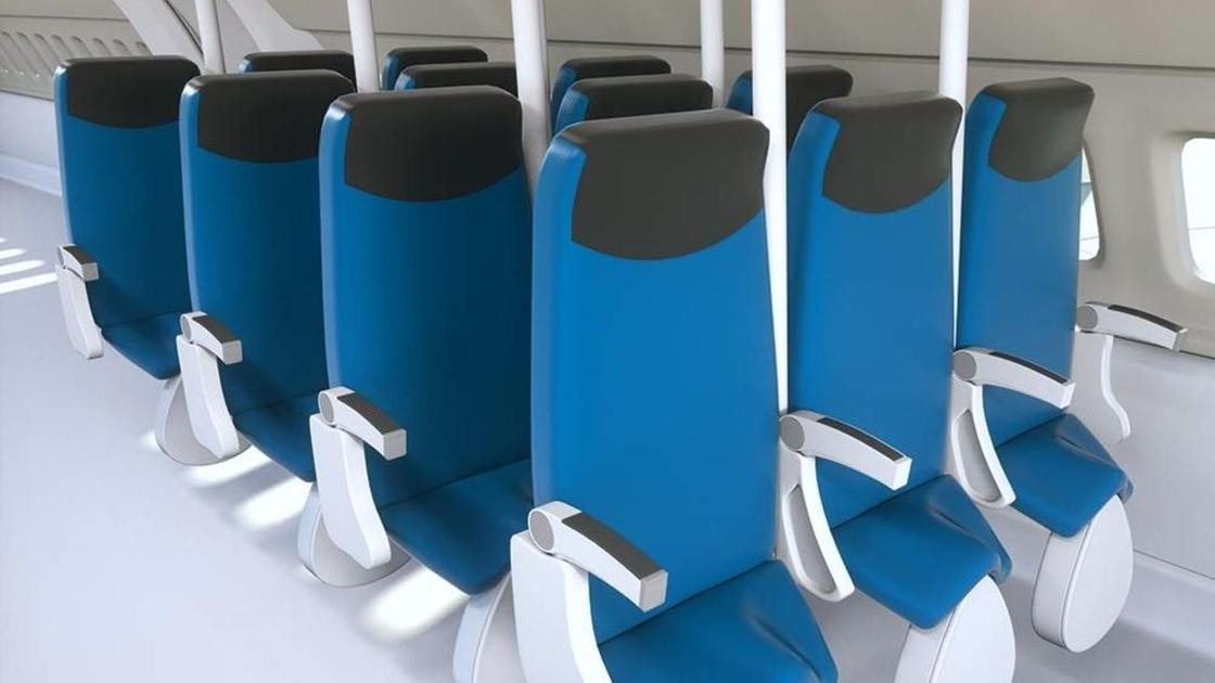 Вертикальные сиденья в салоне самолета