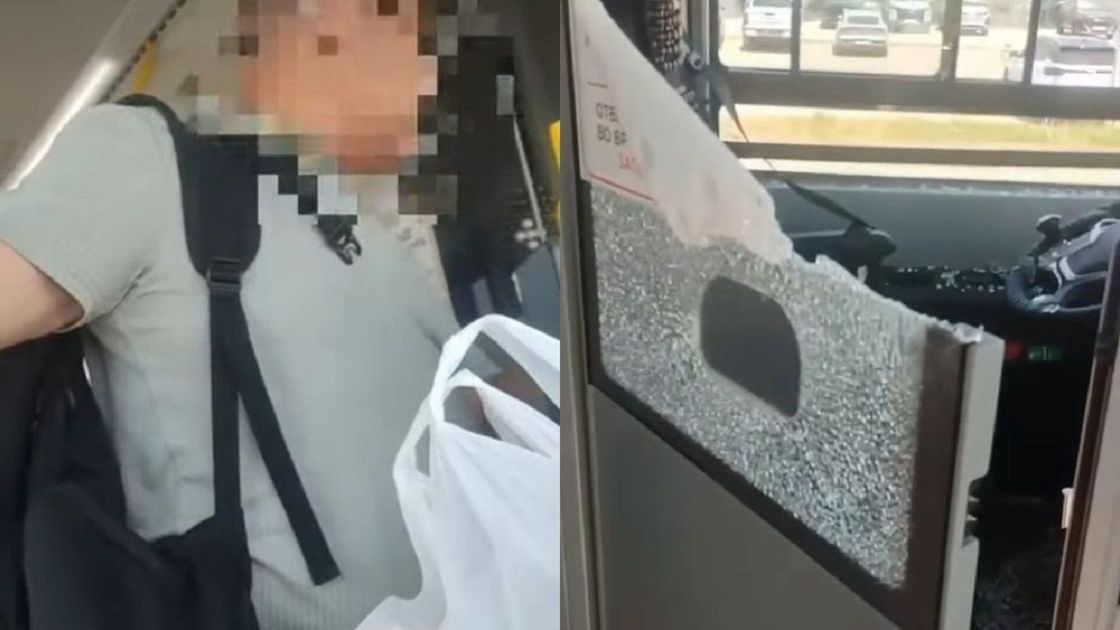 Мужчина и разбитое стекло в автобусе