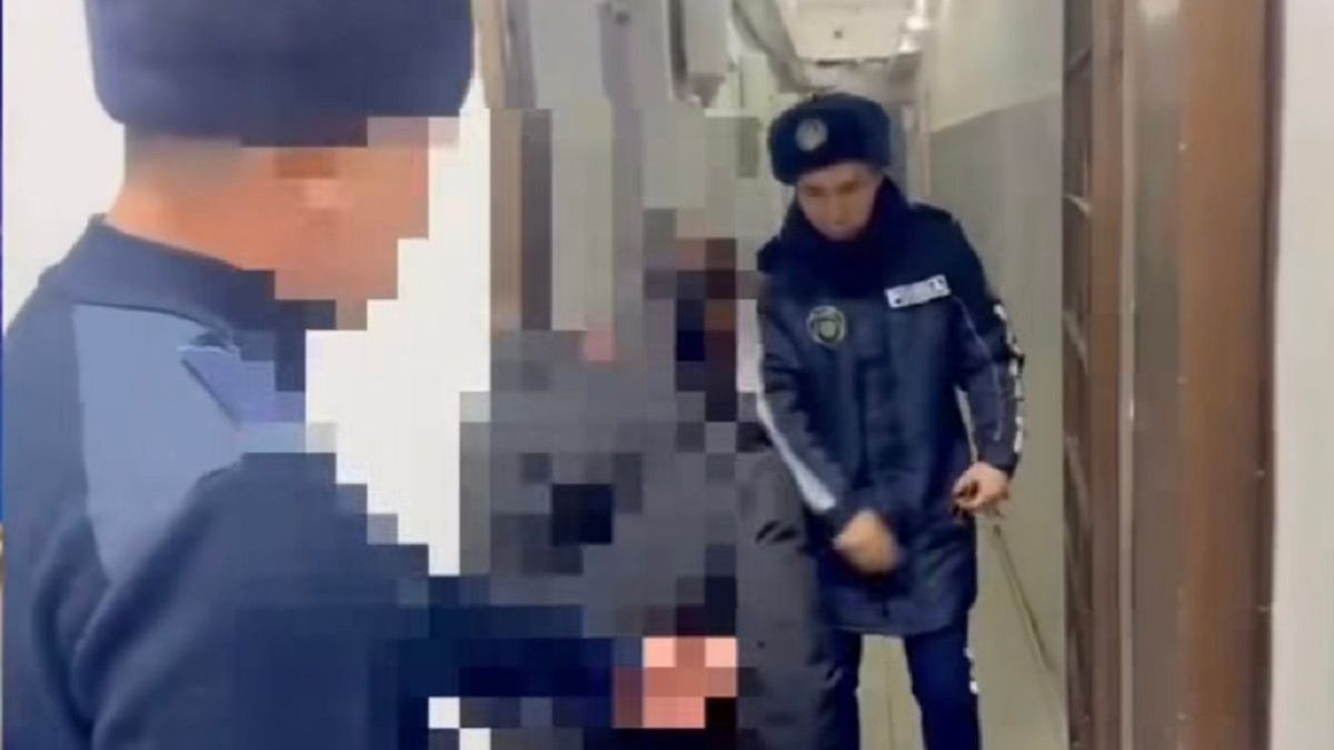 күдікті әйел