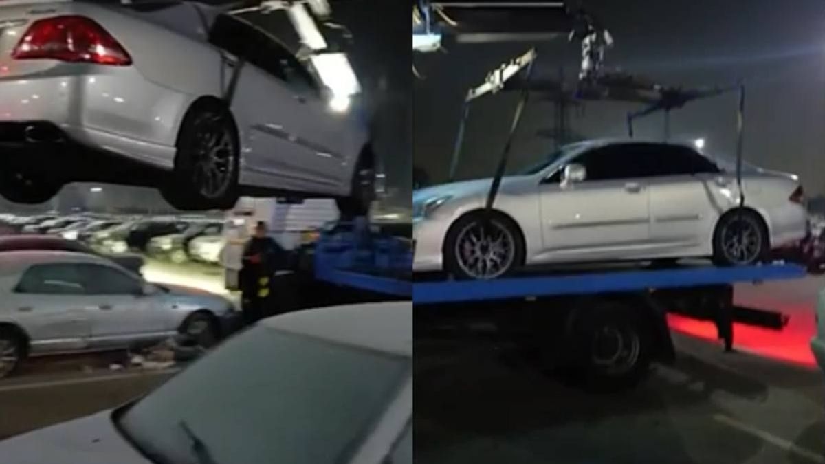 Машину грузят на эвакуатор