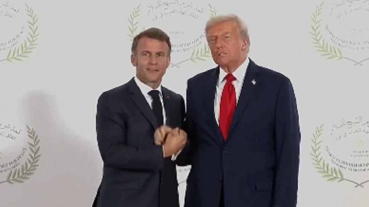 Рукопожатие Макрона и Трампа