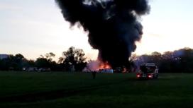 Вид на пожар после крушения самолета