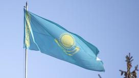 Флаг Казахстана. Фото NUR.KZ/Петр Карандашов