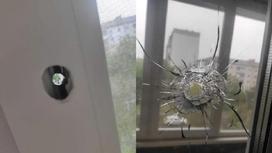 Пулевые отверстия в окнах в Павлодаре