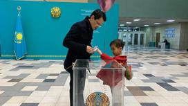 Багдат Мусин с сыном на выборах
