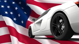 Автомобиль на фоне американского флага