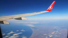 Вид из иллюминатора самолета на Турцию