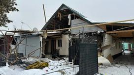 Разрушенный взрывом дом в Алматинской области