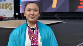Казахстанская тяжелоатлетка Аянат Жумагали
