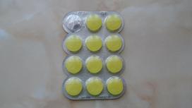 Желтые таблетки в упаковке