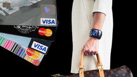 Кредитные карты и девушка с сумкой