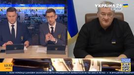 Кадр со взломанной бегущей строкой из эфира телеканала "Украина 24"