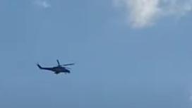Вертолет в небе над Шымкентом