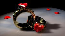 Обручальные кольца с красным камнем