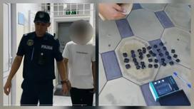 Подозреваемый с полицейским и изъятые наркотики