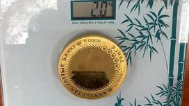 Монета номиналом 100000 тенге