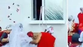 Видео с лезущей в окно невестой в пышном платье развеселило Казнет