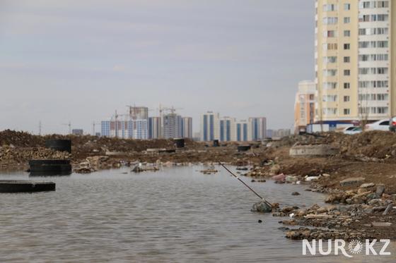 Талдыколь наступает: Астанчане боятся утонуть в грязи, мусоре и сточных водах (фото) Талдыколь наступает: Астанчане боятся утонуть в грязи, мусоре и сточных водах (фото)
