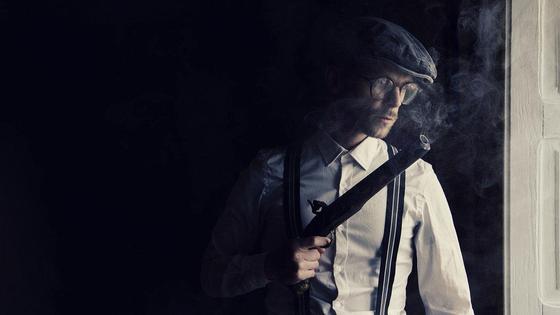 Мужчина с пистолетом Мужчина с пистолетом