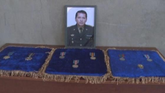 Портрет и медали Меиржана Айманова Портрет и медали Меиржана Айманова