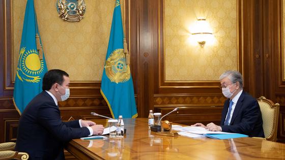 Касым-Жомарт Токаев и Женис Касымбек Касым-Жомарт Токаев и Женис Касымбек